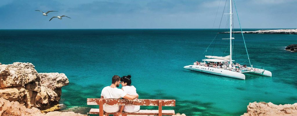 Sea turtle swimming near a resort with hotel deals in Marsa Alam